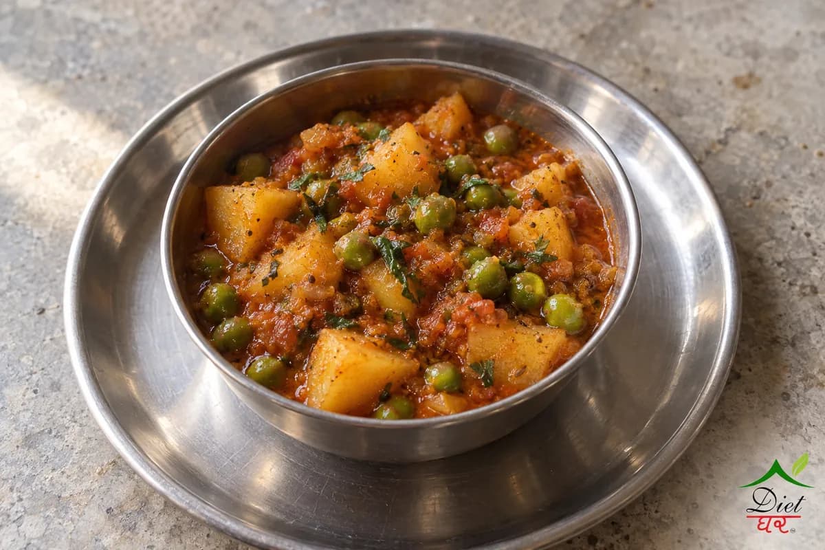 Aloo matar, photographed as one steel katori of aloo matar, in a home kitchen