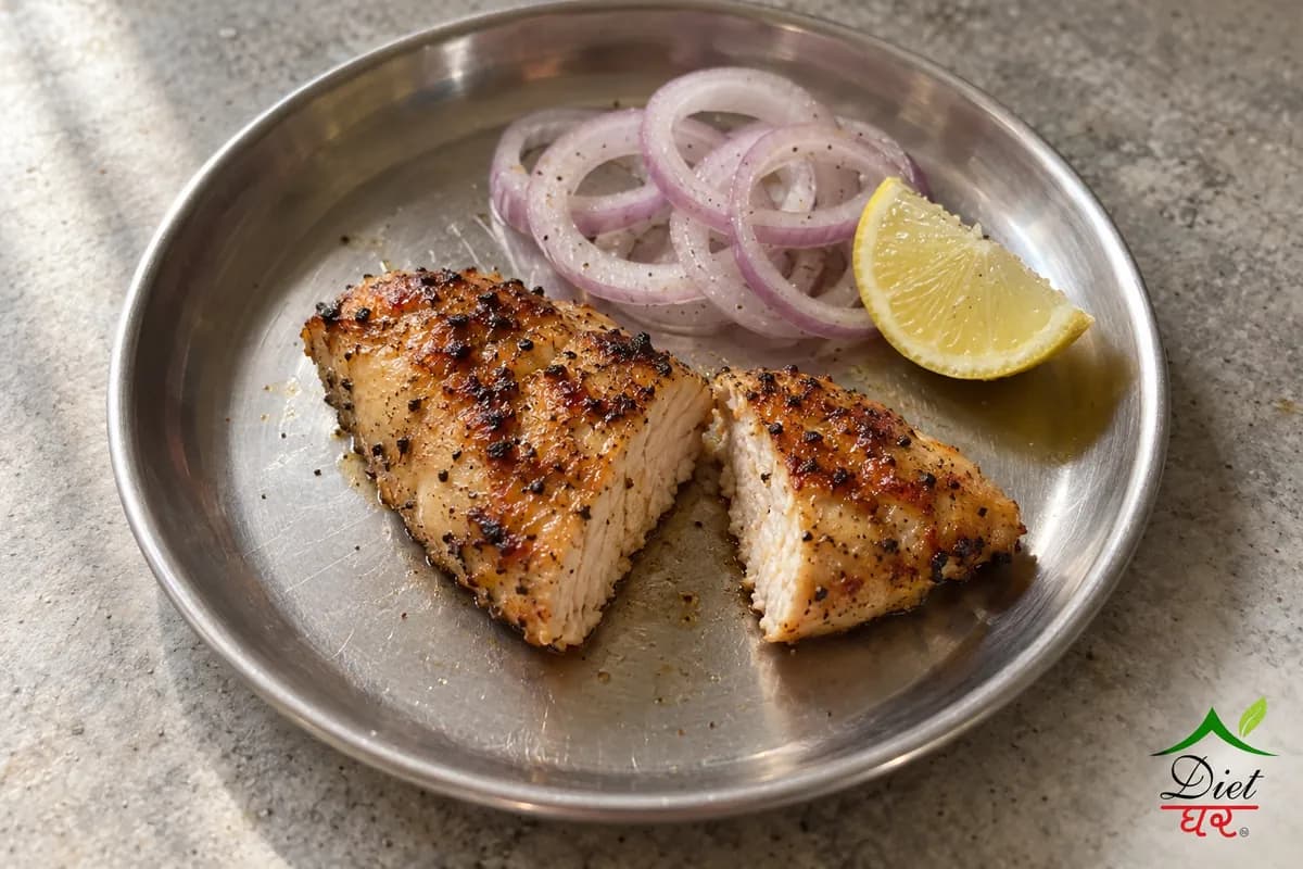 Roasted chicken breast, photographed as one small piece of roasted chicken breast, in a home kitchen