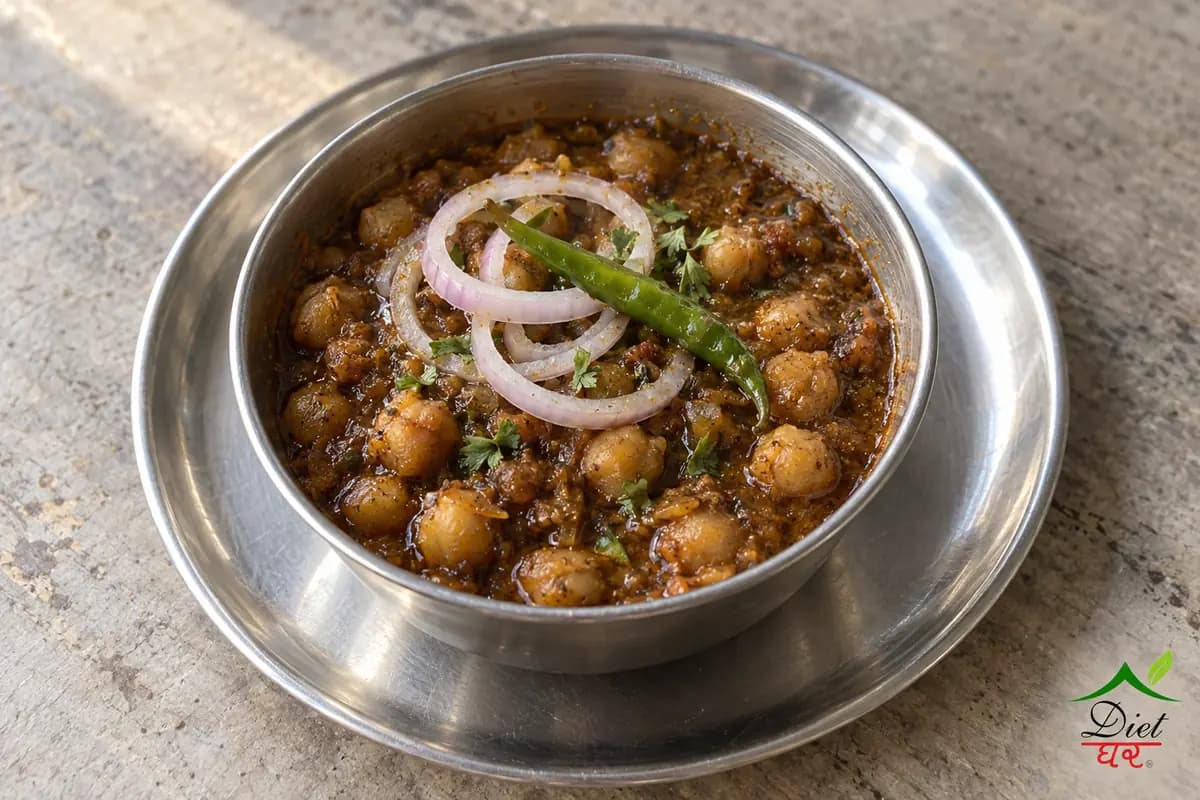 Chole masala, photographed as one steel katori of chole masala, in a home kitchen