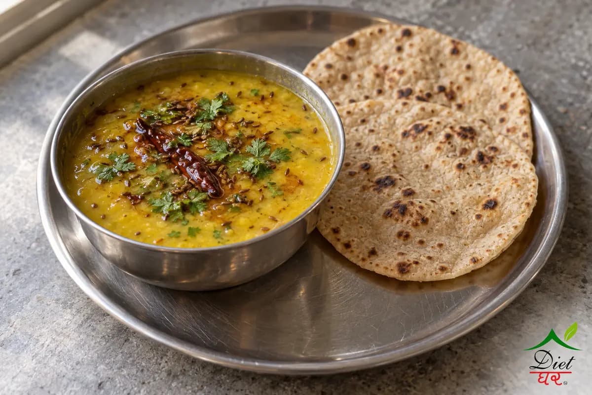 Toor dal tadka, photographed as one steel katori of yellow toor dal tadka, in a home kitchen