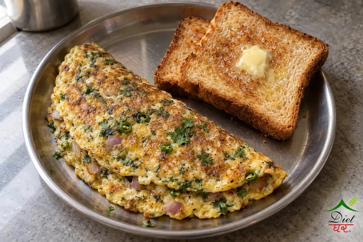 A folded masala omelette with buttered toast on a steel plate