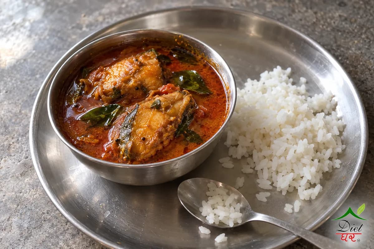 Fish curry, photographed as one steel katori of fish curry, in a home kitchen