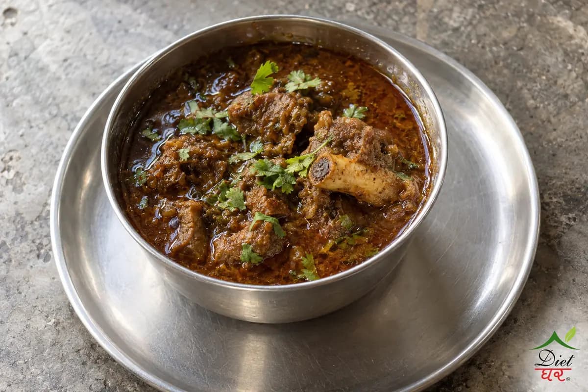 Mutton curry, photographed as one steel katori of mutton curry, in a home kitchen