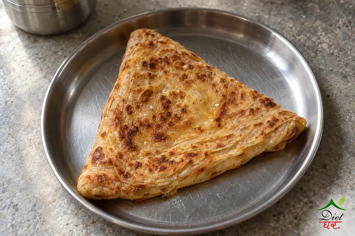 Plain paratha, photographed as one plain layered paratha, in a home kitchen