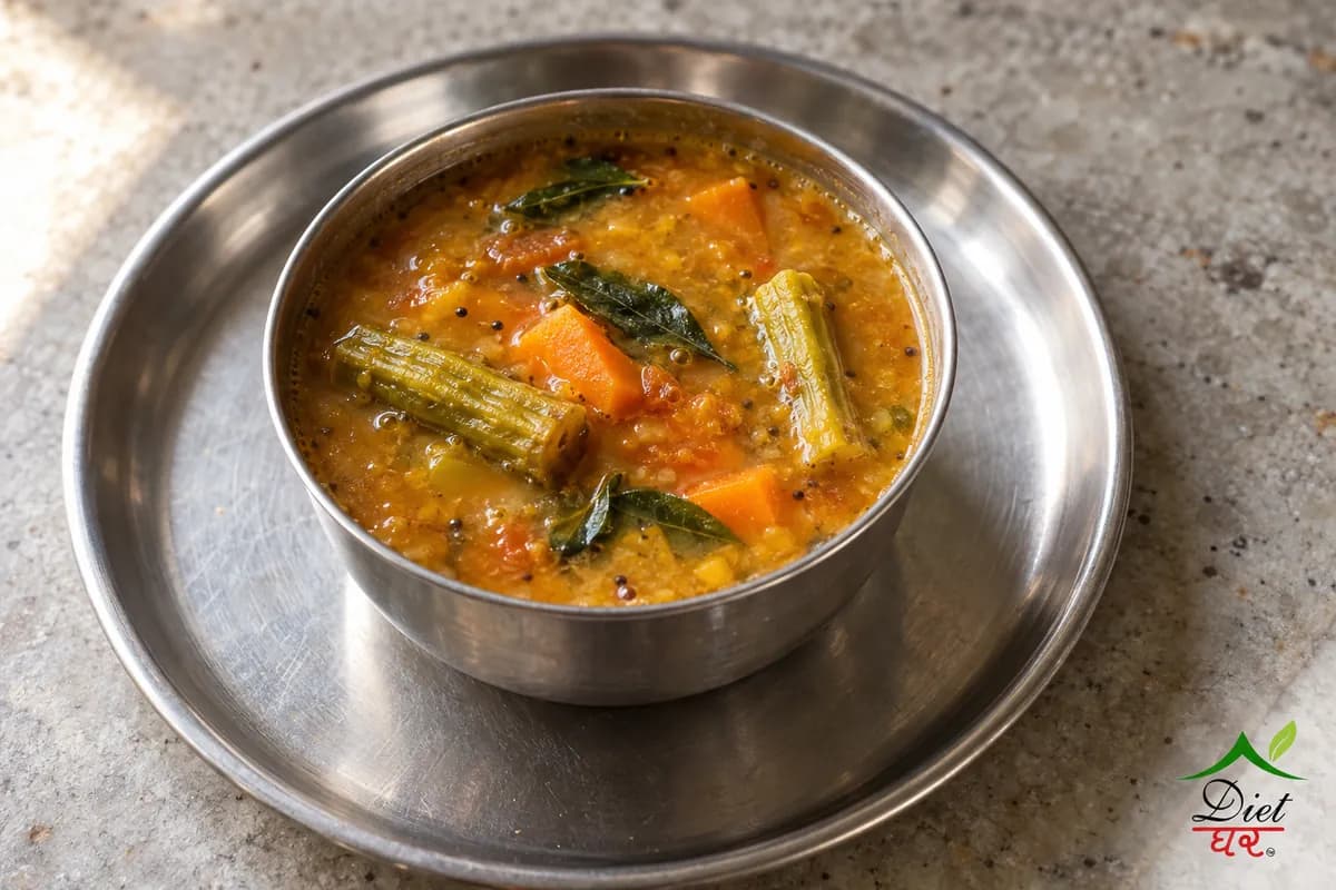 Sambar, photographed as one steel katori of sambar, in a home kitchen