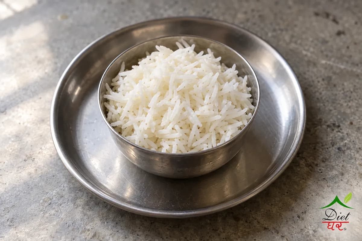 Steamed rice, photographed as one steel katori of fluffy steamed white basmati rice, in a home kitchen