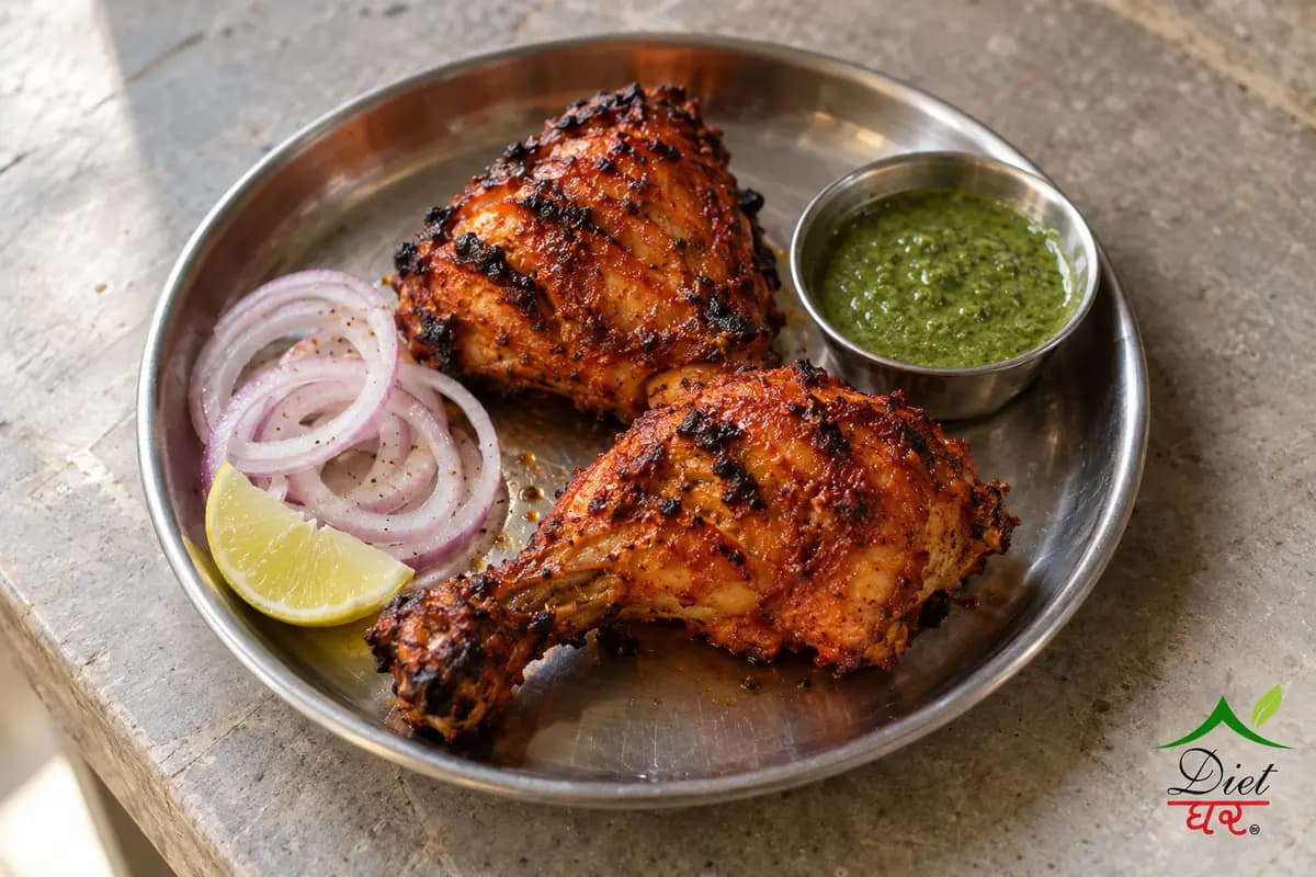 Tandoori chicken, photographed as two pieces of tandoori chicken, in a home kitchen