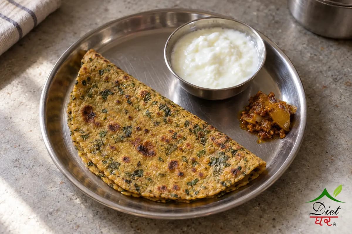 Methi thepla, photographed as one folded methi thepla, in a home kitchen